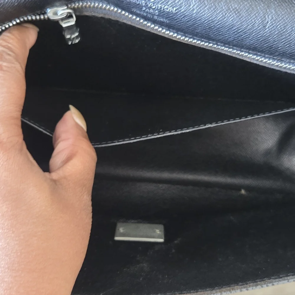 Authentic Louis Vuitton Taiga Selenga clutch